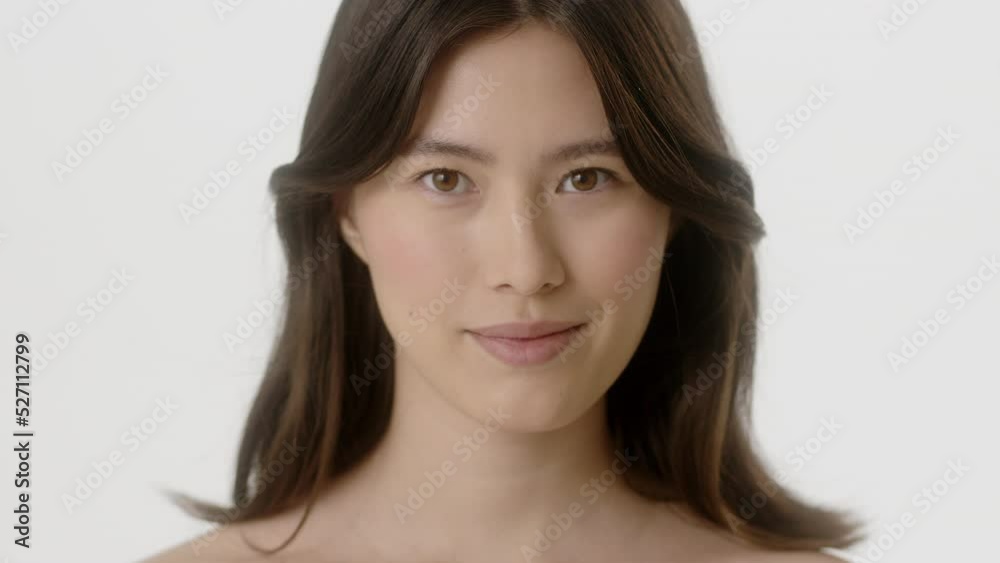 Beauty Woman face Portrait. Beautiful Spa model Girl with Perfect Fresh Clean Skin. Asian Female with Brunette hair looking at camera and smiling. Youth and Skin Care Concept. Isolated on a white Beauty Woman face Portrait. Beautiful Spa model Girl with Perfect Fresh Clean Skin. Asian Female with Brunette hair looking at camera and smiling. Youth and Skin Care Concept. Isolated on a white