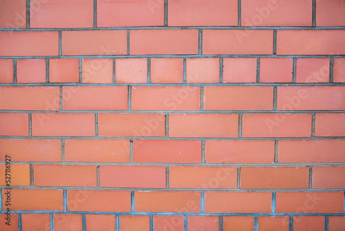 Red vintage old brick wall texture for retro exterior design.