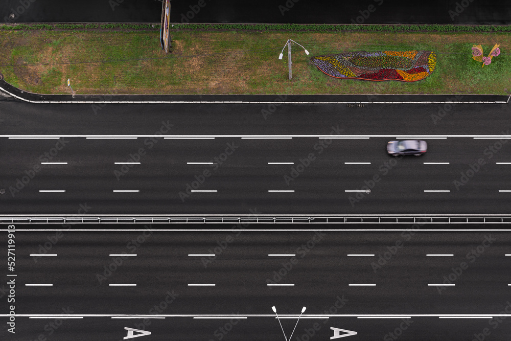 top view of the highway with a passing car