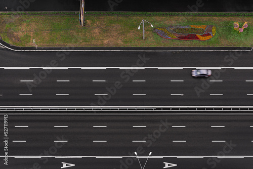 top view of the highway with a passing car