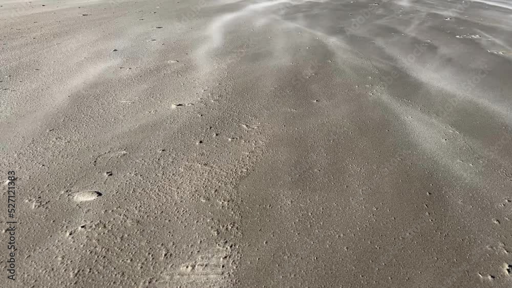 Strong Wind Blows The Streams of Sand on the ground of tthe seaside HD 30 fps Strong Wind Blows The Streams of Sand on the ground of tthe seaside HD 30 fps