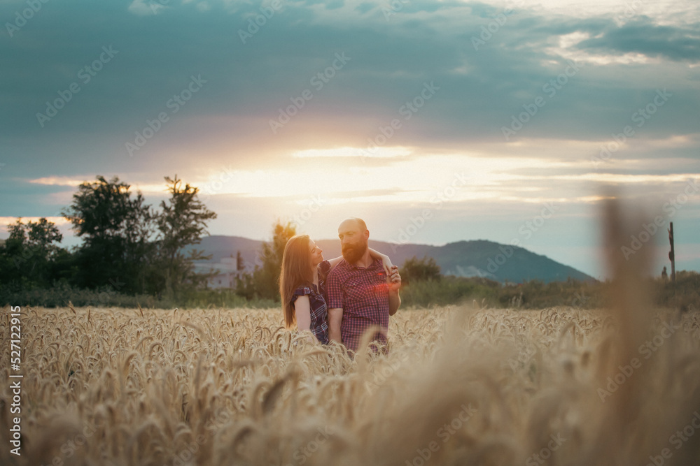 Loving couple in a wheat field. Loving couple in a wheat field.