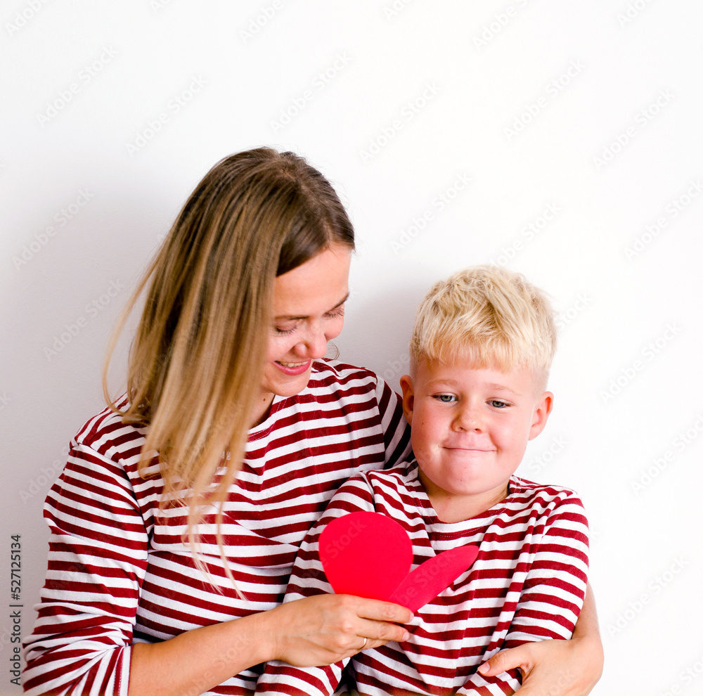 Portrait of happy mother and son over white background , Mother’s Day background Portrait of happy mother and son over white background , Mother’s Day background