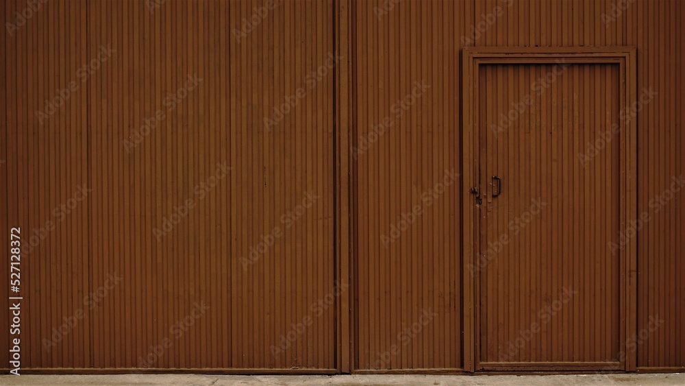 Fototapeta premium brown industrial metal door as background