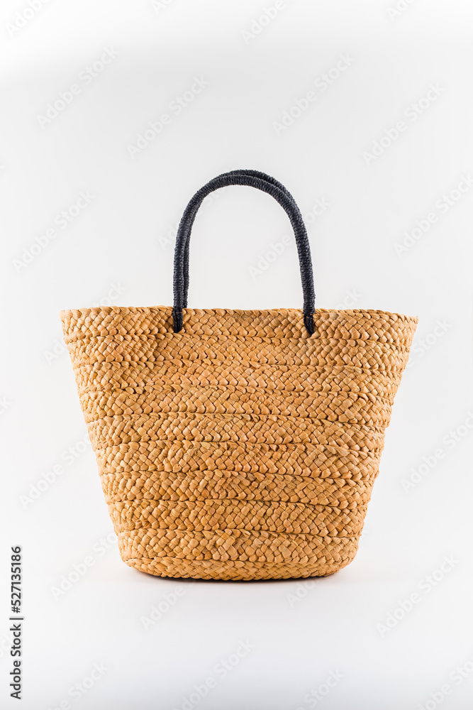 female summer straw bag isolated on white background female summer straw bag isolated on white background