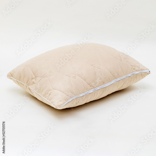 beige sleeping pillow isolated on white background