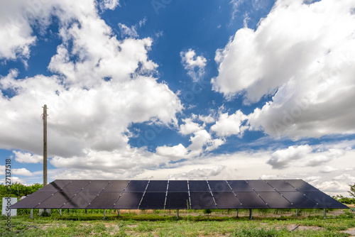 solar panels on a green field