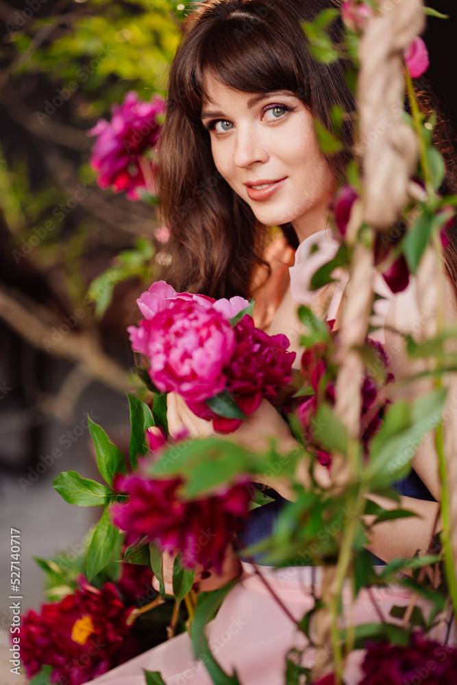 fabulous. a beautiful and gentle woman in peony flowers. feminine beauty. fabulous. a beautiful and gentle woman in peony flowers. feminine beauty.