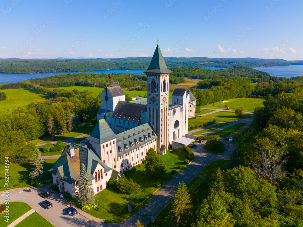 Fototapeta premium Abbaye de Saint Benoit du Lac aerial view on the Lake Memphremagog in Memphremagog County, Quebec QC, Canada. 
