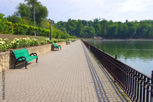 Moldova. Kishinev. 08.29.2022. Embankment of the lake in the walking area and alleys.