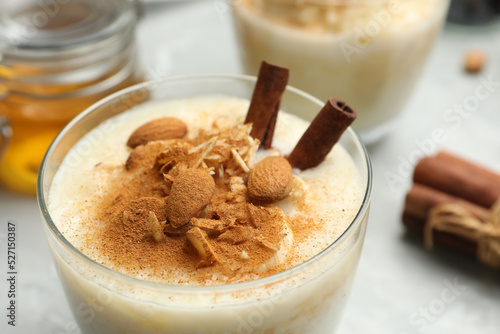 Delicious rice pudding with almonds and cinnamon, closeup