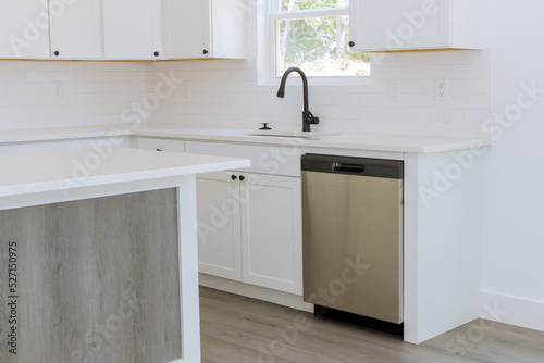 Installation of new kitchen cabinets in a kitchen, you can view a water tap sink