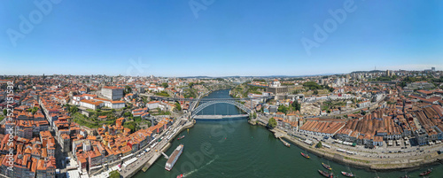 An aerial panoramic view of Porto and the Douro River with bridges 