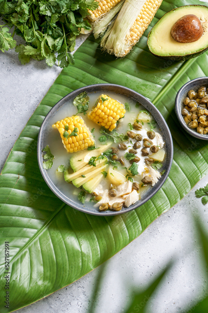 Traditional Ajiaco Colombiano - Colombian Soup with potato, chicken, avocado, common in Colombia, Cuba and Peru. Latin America Traditional Ajiaco Colombiano - Colombian Soup with potato, chicken, avocado, common in Colombia, Cuba and Peru. Latin America