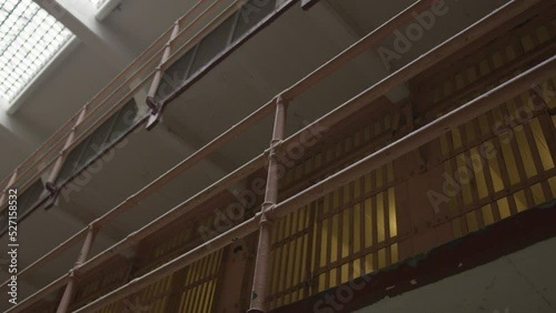 Empty prison cells while lights are turned on