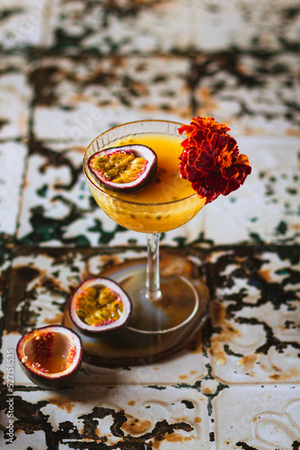 Passion fruit martini with French marigold