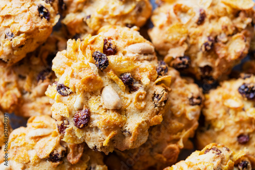 Close-up view of cornflake, sultana and peanut cookies. photo