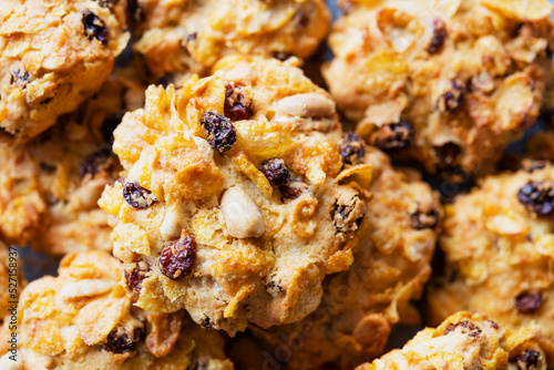 Close-up view of cornflake, sultana and peanut cookies.