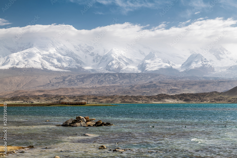 Muztagata snow mountain and Lake Karakul landscape in Kashgar city Xinjiang Uygur Autonomous Region, China.