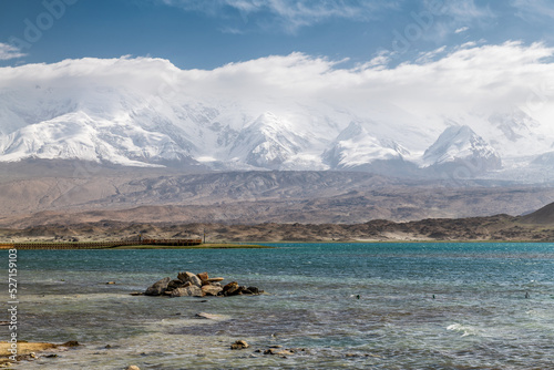 Muztagata snow mountain and Lake Karakul landscape in Kashgar city Xinjiang Uygur Autonomous Region, China.