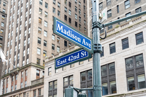 New York City, USA - August 22, 2022: The Madison Ave and East 42nd St street signs are shown in Manhattan, New York City, USA.  © JHVEPhoto