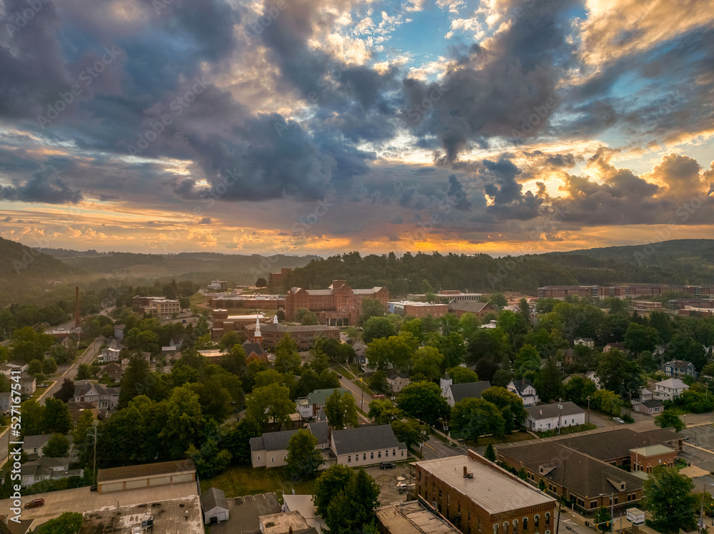 Morning aerial view of Mansfield Pennsylvania sleepy small town in the rust belt of America with a small university dramatic sky