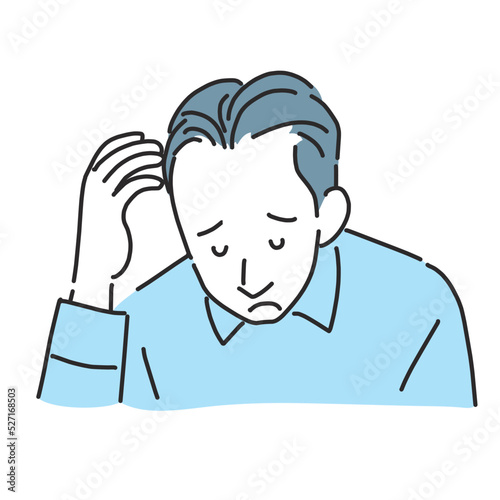 薄毛が気になって落ち込む男性