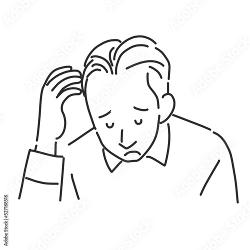 薄毛が気になって落ち込む男性
