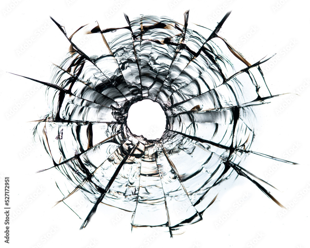 Fototapeta premium cracks in the glass, a hole from bullets in the glass on a white background.