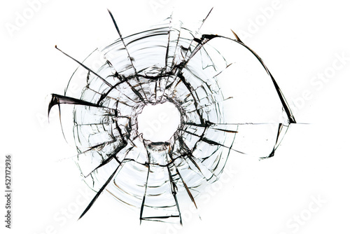 cracks in the glass, a hole from bullets in the glass on a white background.