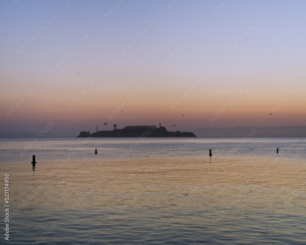 Beautiful silhouette of Island at sunrise