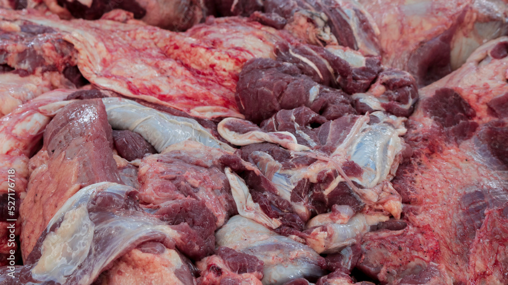 A close up portrait and texture of raw lamb meat at the Feast of Qurban during Eid Al Adha Al Mubarak.