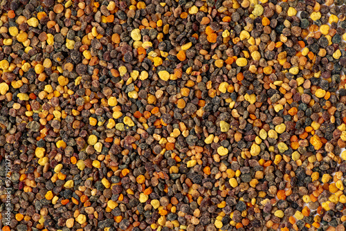 Pile of bee pollen on white