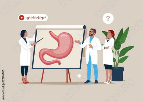 Doctor pointing on demonstration board with human Stomach explain its opportunities. Medical conference. Design element for gastroenterology, medicine, biology.