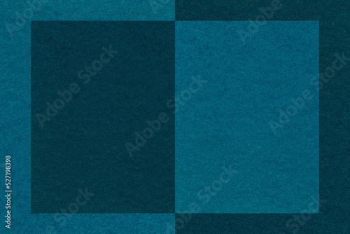 Texture of navy blue and turquoise paper background pattern. Structure of craft dark cerulean cardboard with frame.