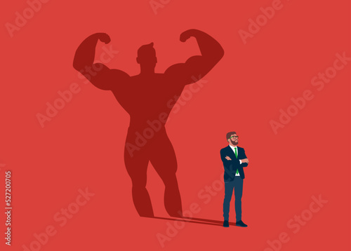 Businessman dreams of becoming a bodybuilding. Confident handsome young man standing bodybuilding shadow concept illustration.