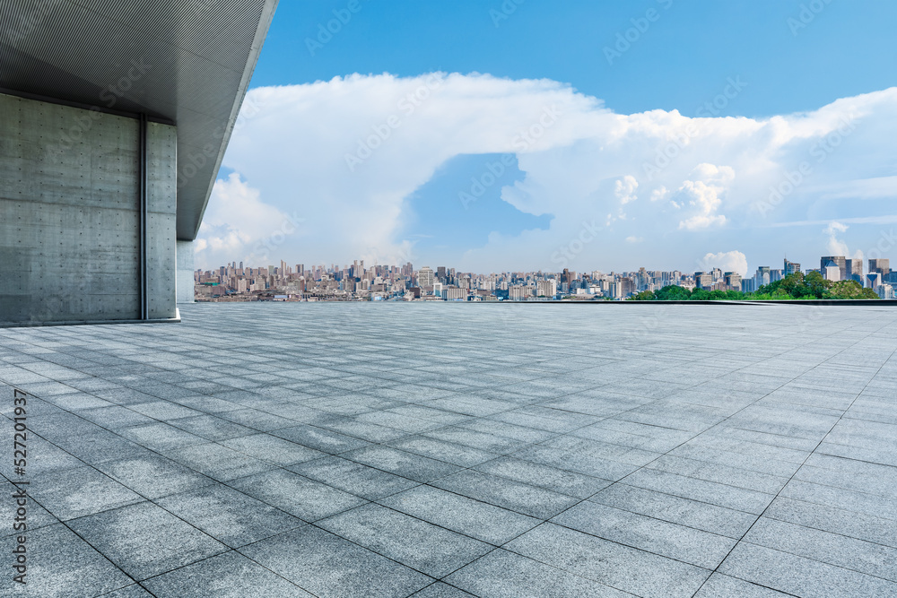 Empty square floor and city skyline with modern buildings scenery
