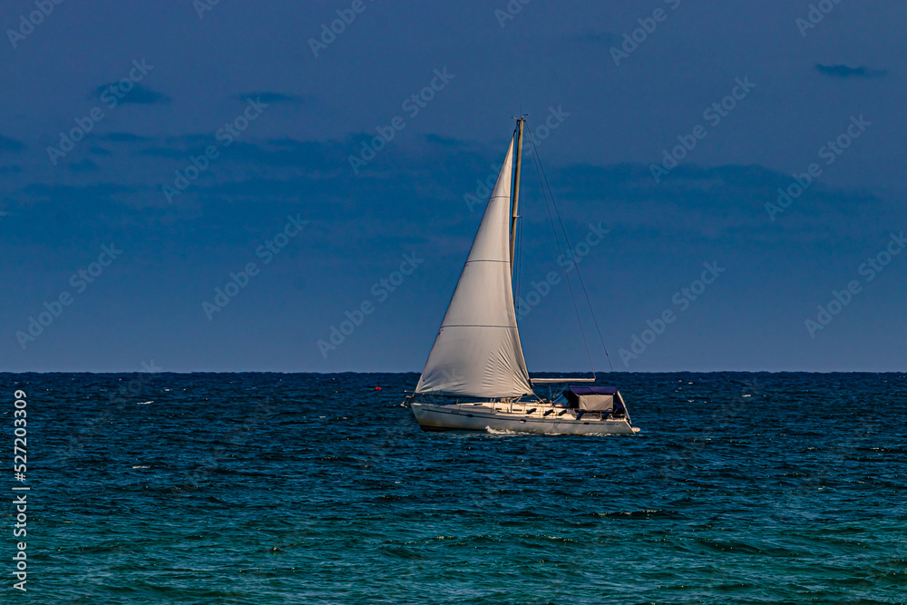 white yacht on sea water
