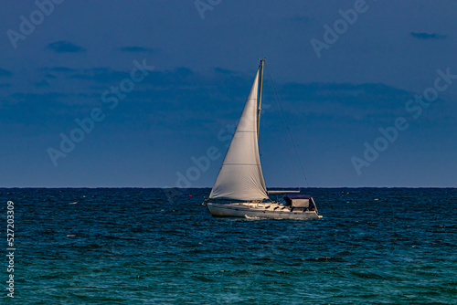 white yacht on sea water