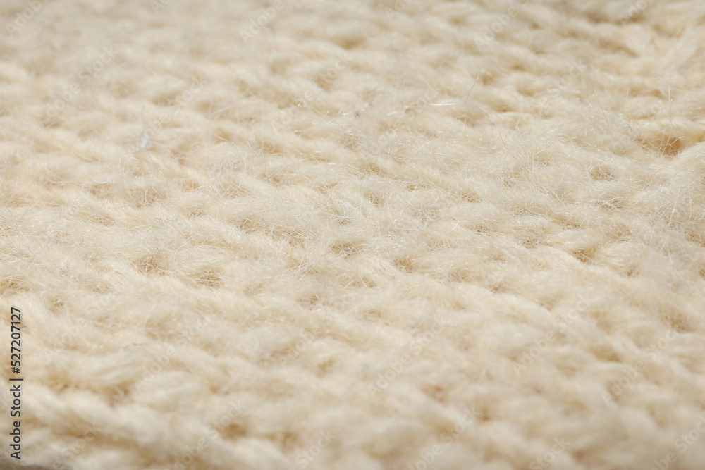 Knitted sweater texture on whole background, close up Knitted sweater texture on whole background, close up