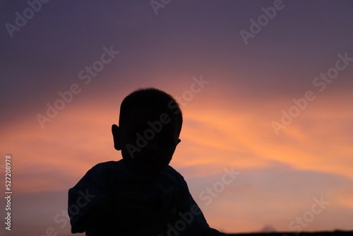silhouette of a person in sunset