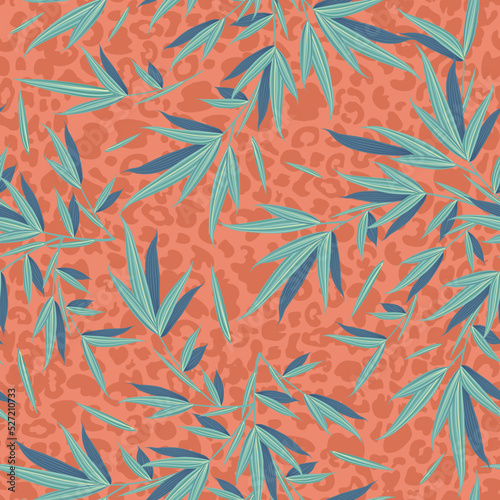 Floral seamless pattern on animalistic leopard background. Texture with exotic leaves. Trendy botanical template for clothes, textiles and wrapping paper.