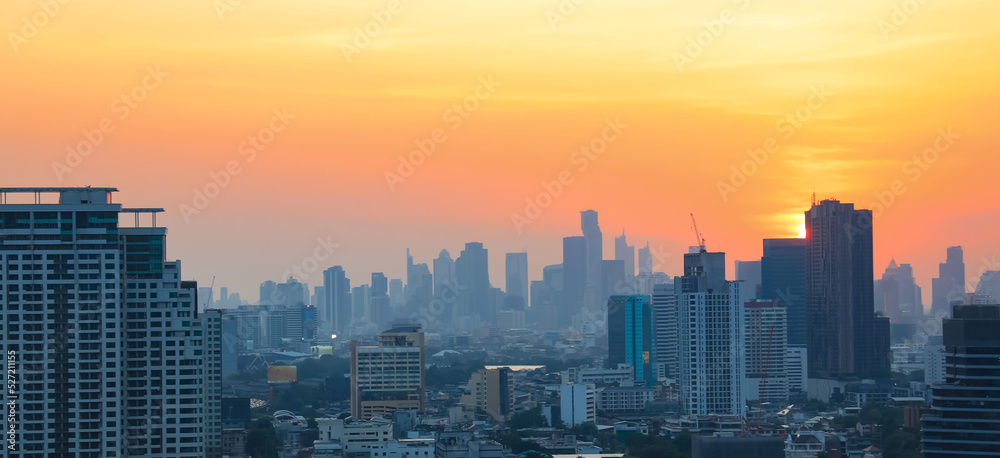 The sunset sky scene in a cityscape town ,Bangkok ,Thailand