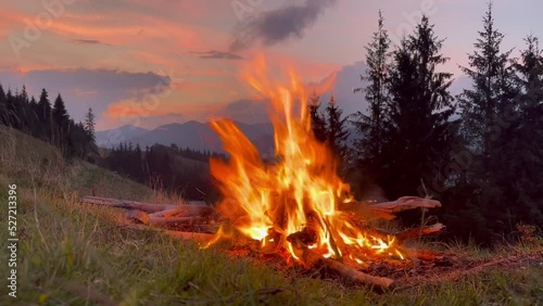 Campfire in the mountain. Camp Fire. Burning bonfire in the Carpathian mountains.