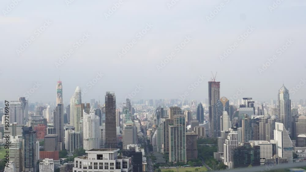 A beautiful skyline view of the many impressive skyscrapers of Bangkok, the capital of Thailand on a clear blue day A beautiful skyline view of the many impressive skyscrapers of Bangkok, the capital of Thailand on a clear blue day