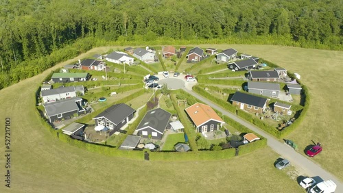 Aerial Orbiting Shot Above Circular Garden City in Denmark photo