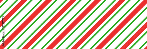 Free Download Christmas candy cane striped seamless pattern. Christmas candycane background with red and green stripes. Peppermint caramel diagonal print. Xmas traditional wrapping texture. Vector illustration. - GFXLoad