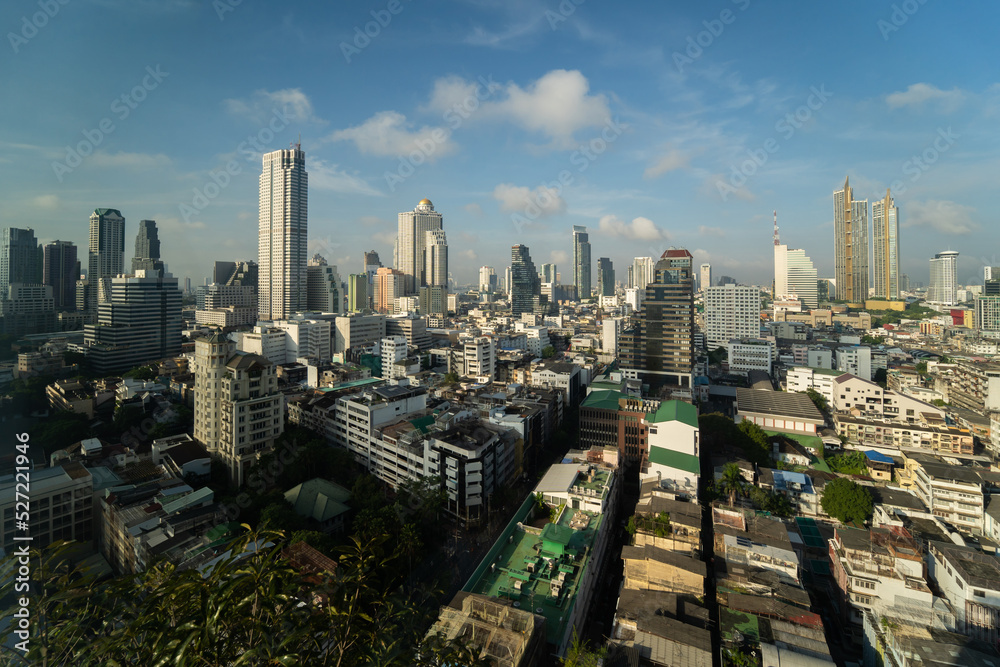 Obraz premium Tall skyscrapers feature urban architecture and modern Bangkok skylines.bangkok city landscape sunset scenery.