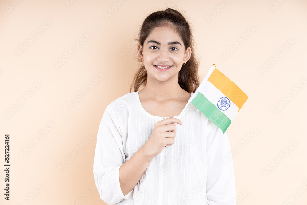 Indian girl with holding Tricolor flag in hand Indian girl with holding Tricolor flag in hand