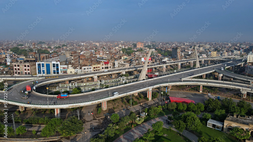 Fototapeta premium A 180-degree aerial panorama of Aazadi Chowk interchange after sunrise. 